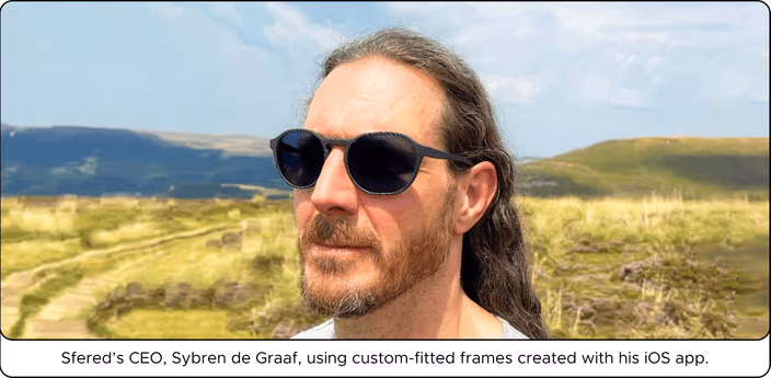 Sybren de Graaf wearing custom-fitted eyewear in an outdoor landscape setting