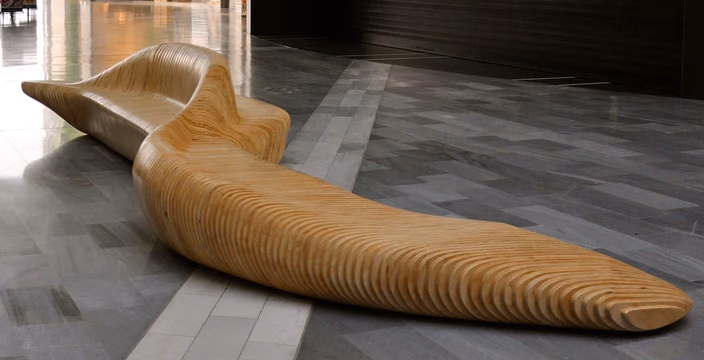 Parametric bench with organic wooden form designed for Ikea Center Group