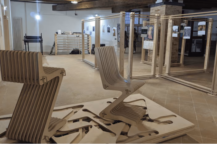 Visionaria workshop furniture display with parametrically designed wooden chairs and installations