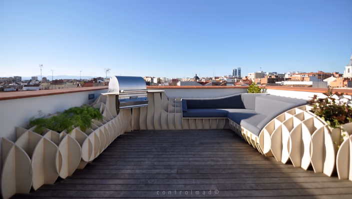 Rooftop terrace in Madrid with parametric seating elements and views of the city