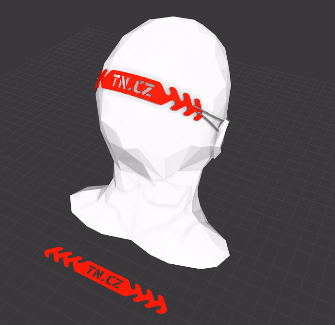 White 3D-printed face shield with red parametric design markings