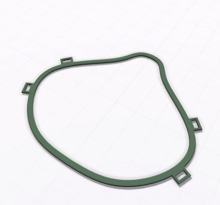 Green 3D-printed face shield frame with dimension annotations for customization