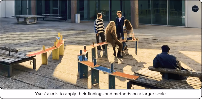 Outdoor installation at MAK Vienna with participants gathered around wooden stools and benches created through the Stool around the World project