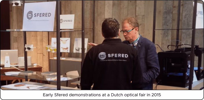Sfered booth display at optical fair showing custom eyewear demonstrations and products