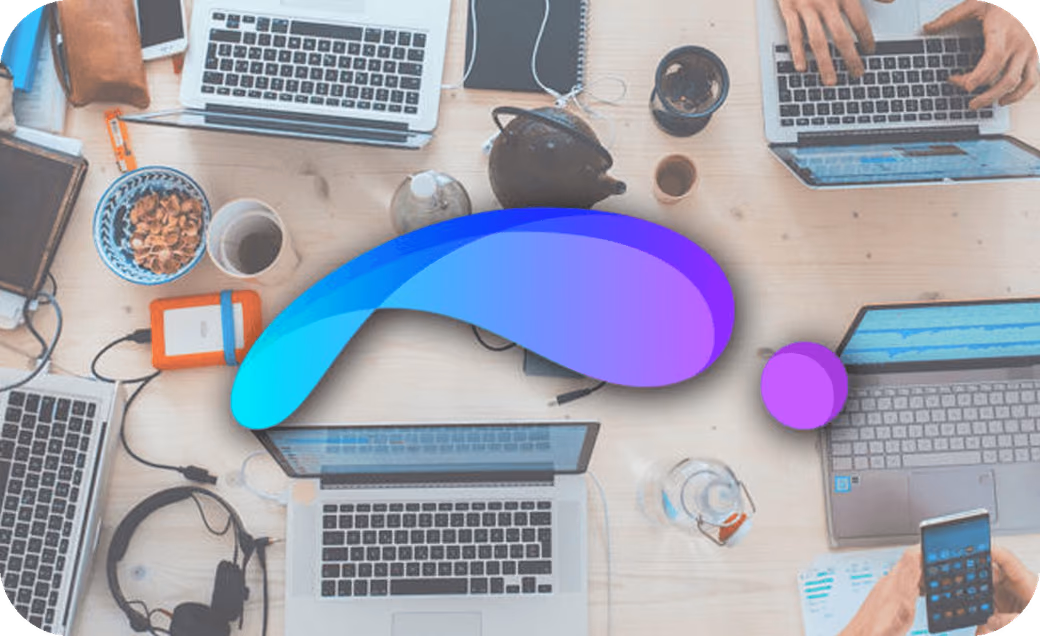 Collaborative design workspace with multiple laptops and the ShapeDiver logo