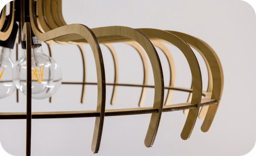 Custom Shapelamp pendant lights with curved wood frame and glass globe showing the minimalist design aesthetic