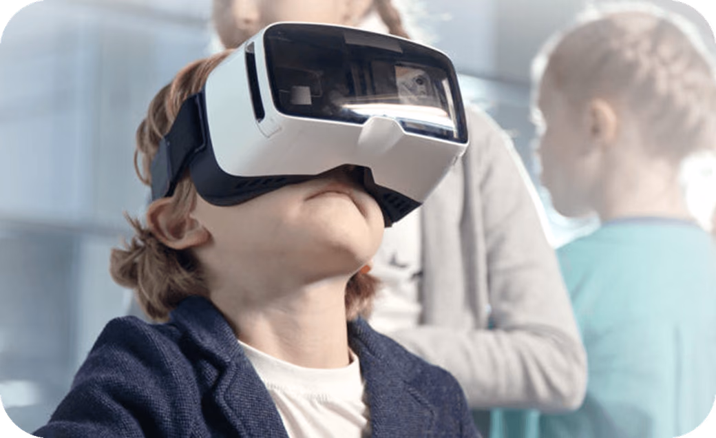 Child wearing a VR headset, representing how technology is becoming integrated into human experiences